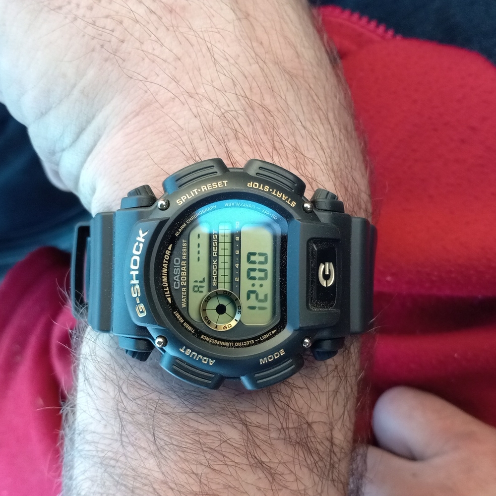 G shock Men's Gold and Black Watch